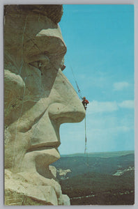 Cleaning The Head Of Lincoln On Mount Rushmore, South Dakota, Vintage Post Card.