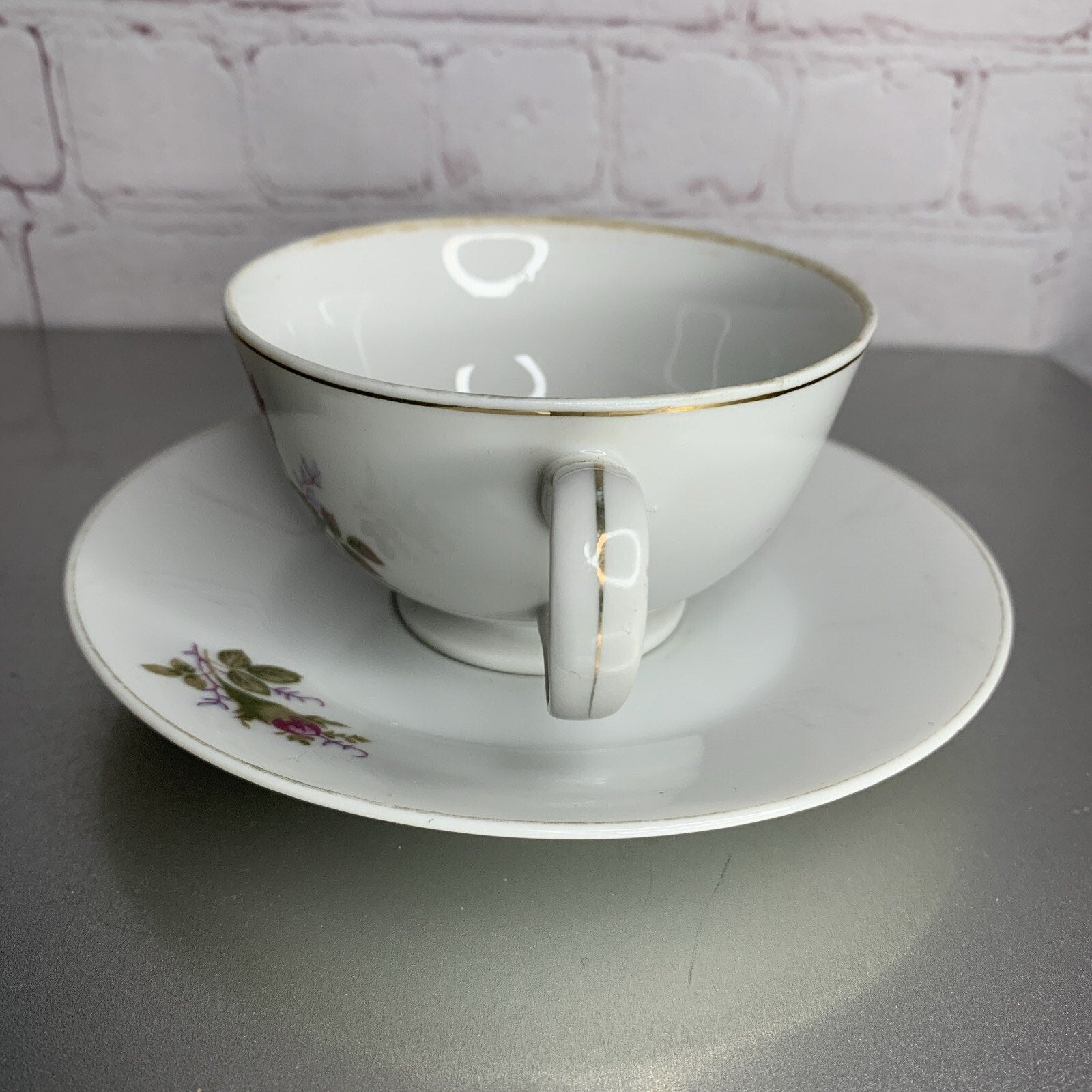 Vintage Japanese porcelain teacup and saucer set with English rose floral pattern and gold trim”