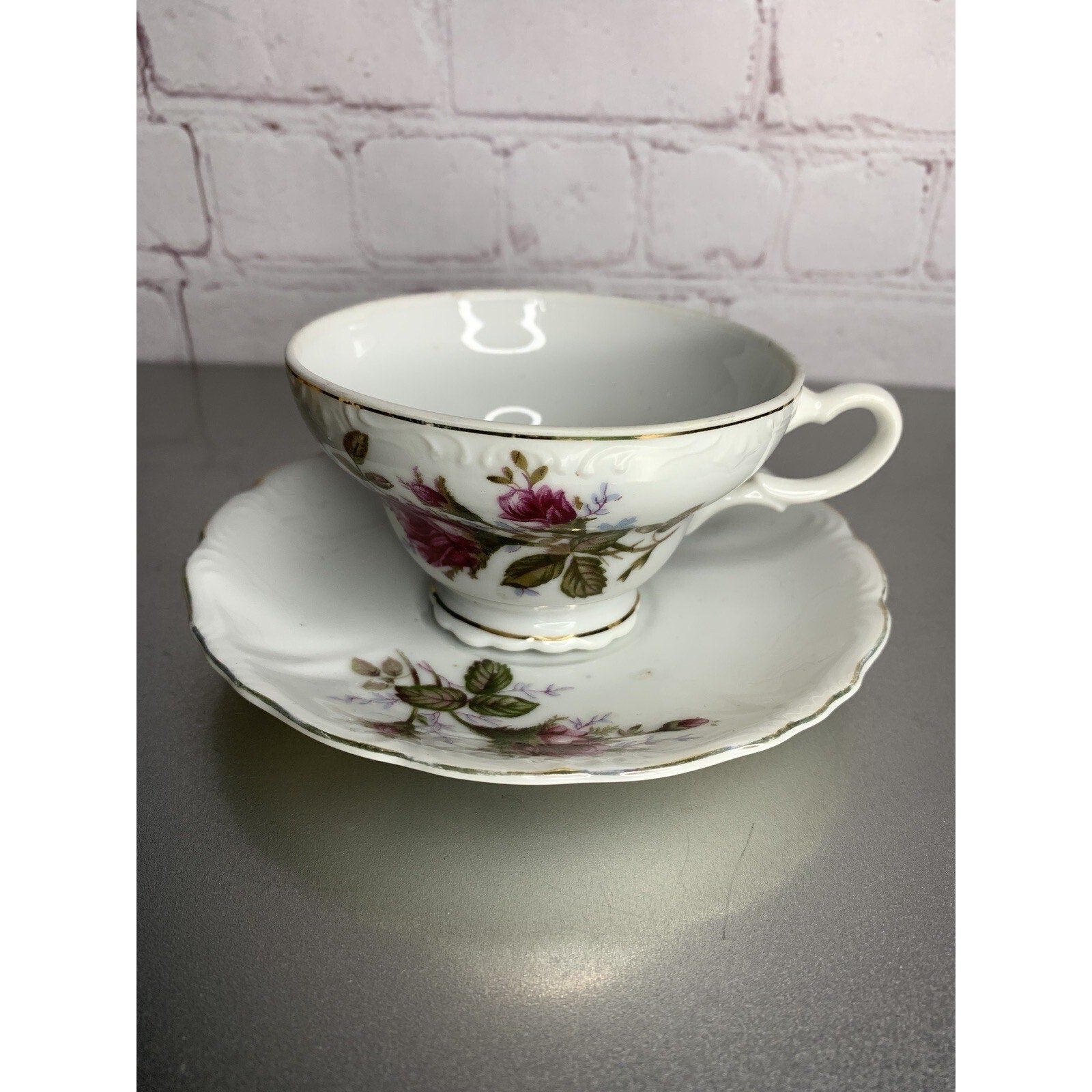 Vintage English rose teacup and saucer made in Japan, porcelain china with gold trim, floral pattern
