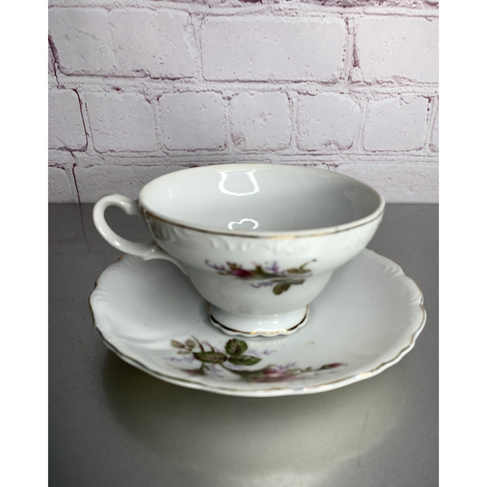 Vintage English rose teacup and saucer made in Japan, porcelain china with gold trim, floral pattern