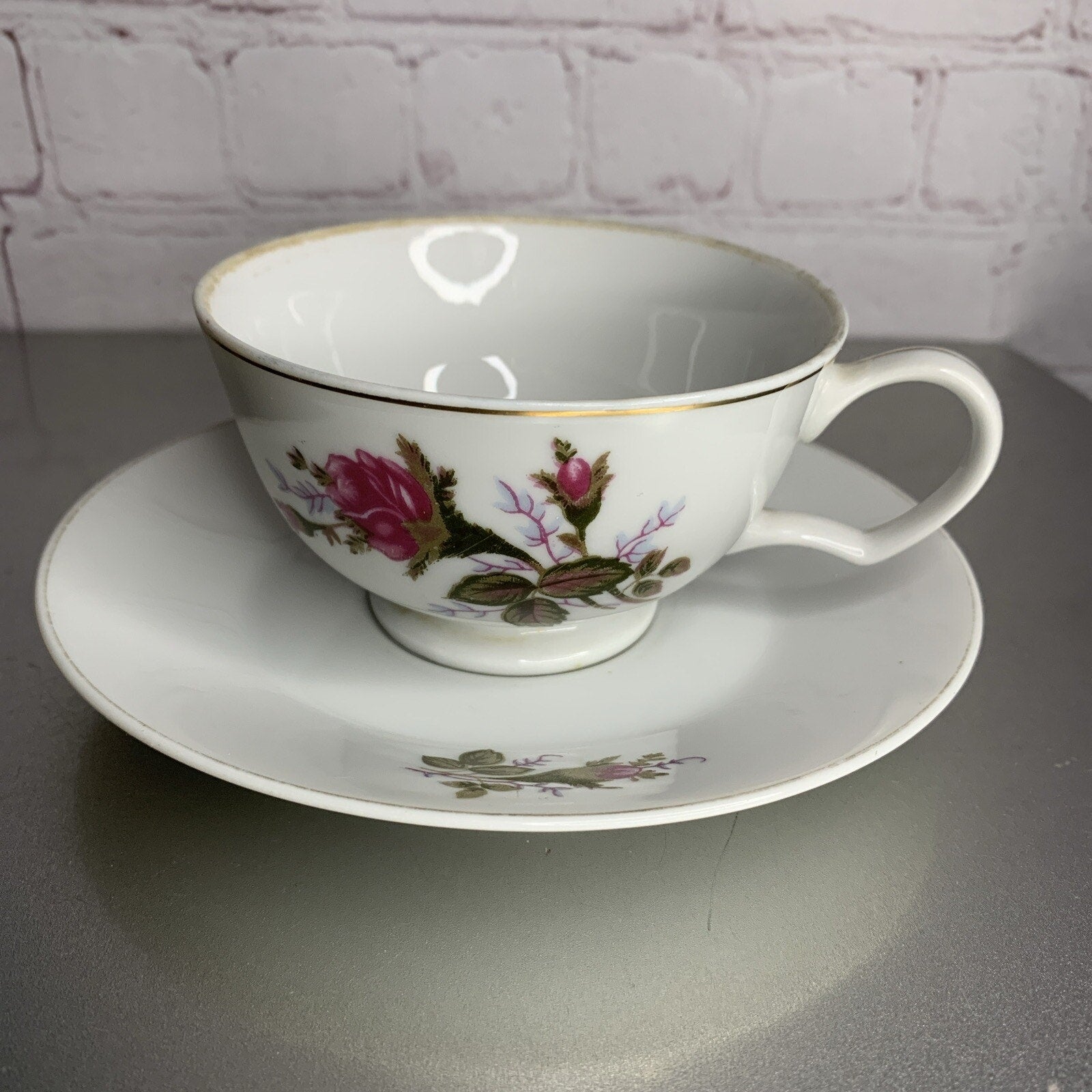 Vintage Japanese porcelain teacup and saucer set with English rose floral pattern and gold trim”